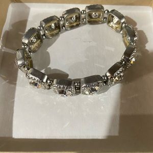 Bracelet-stretchy with clear “gems”. NIB great piece!